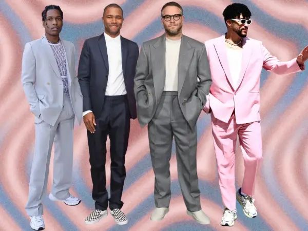 Four men in stylish suits with sneakers. A$AP Rocky in a light blue suit, Frank Ocean in a dark suit, Seth Rogen in a grey suit, and Bad Bunny in a pink suit.